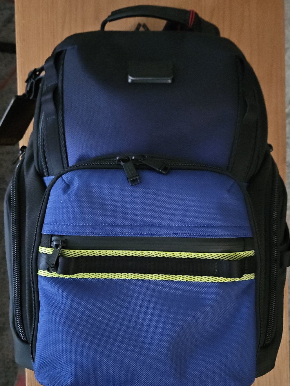 NWT, Tumi Alpha Bravo Backpack In Black And Bkues With Lime Accent.